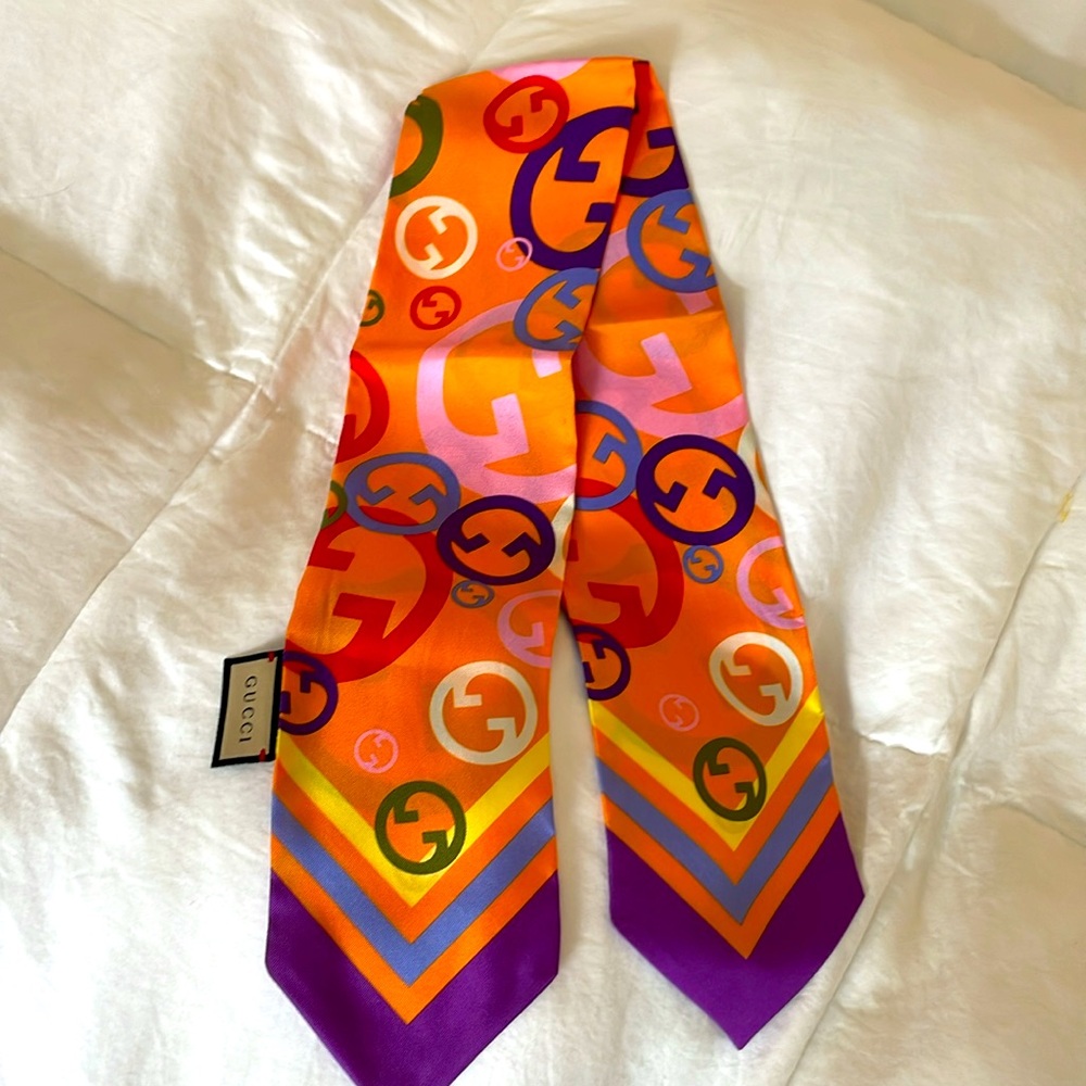 Lightly used GUCCI silk neck scarf.